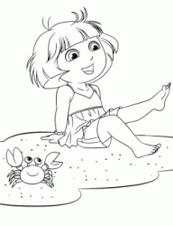 Dora sulla spiaggia in compagnia di un granchio